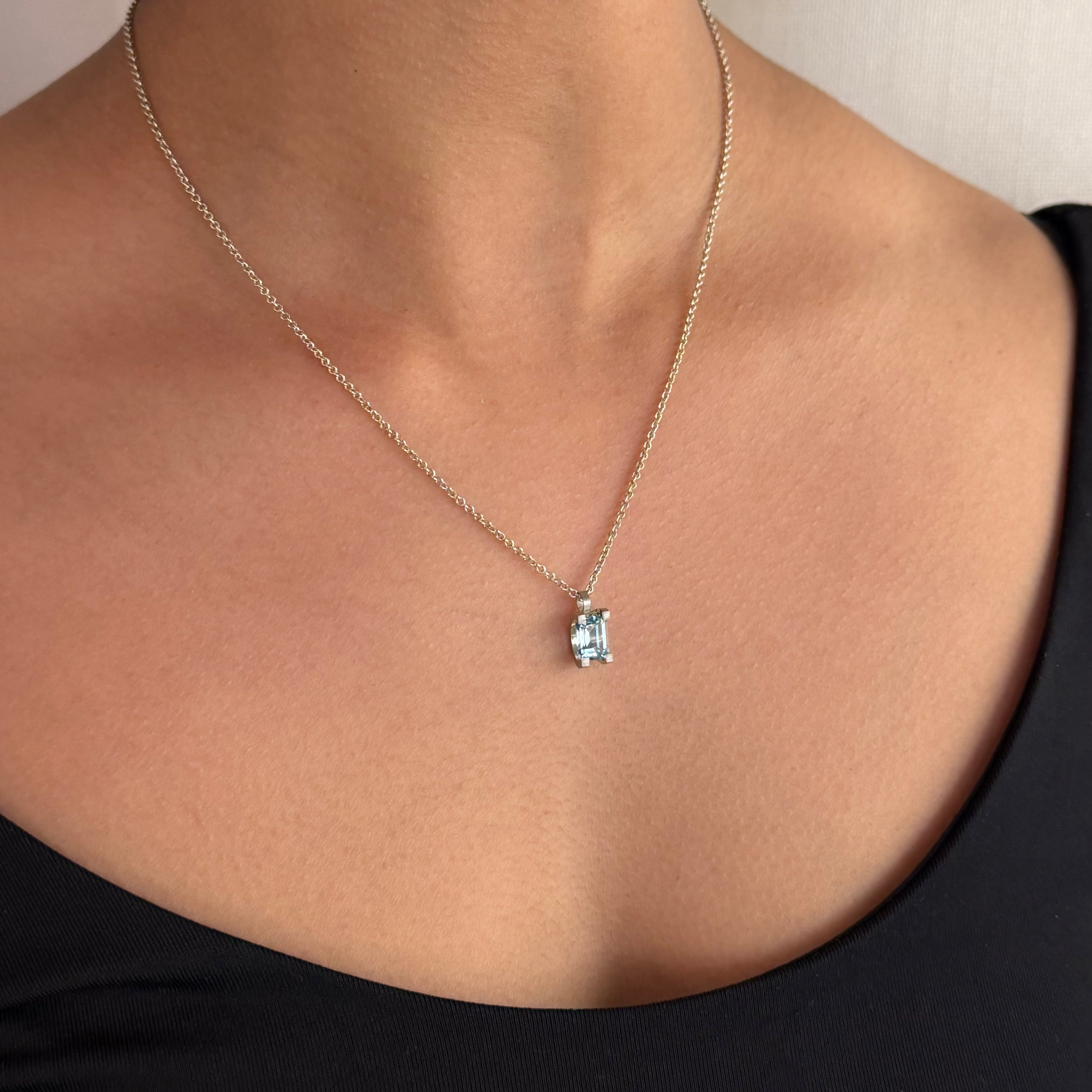 Curve Claw Topaz Pendant