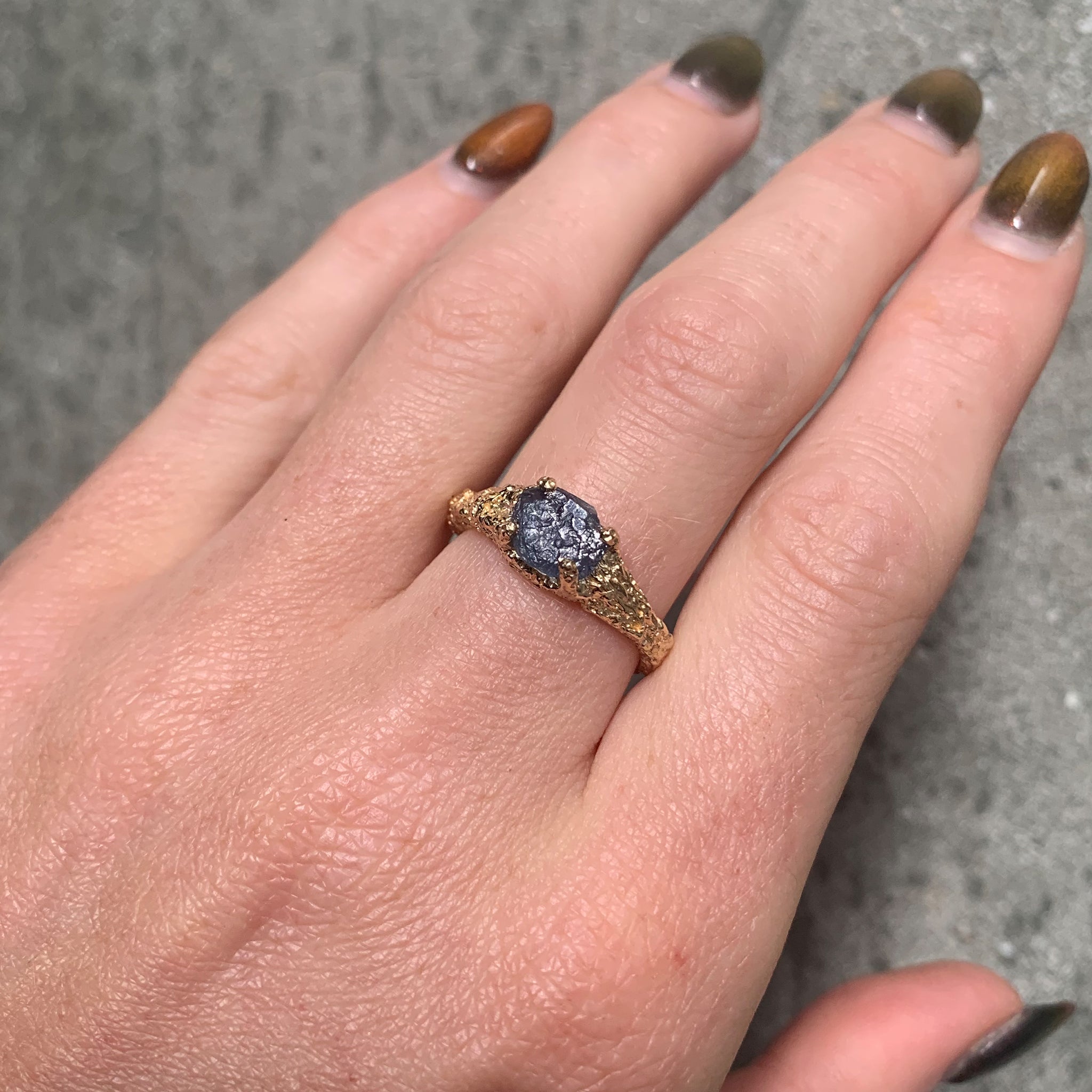 Graceful Inner Islands Uncut Sapphire Ring