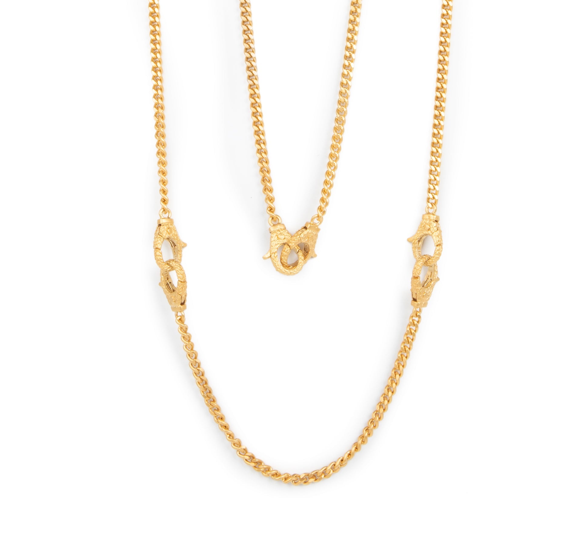 Gold chain necklace on a white background